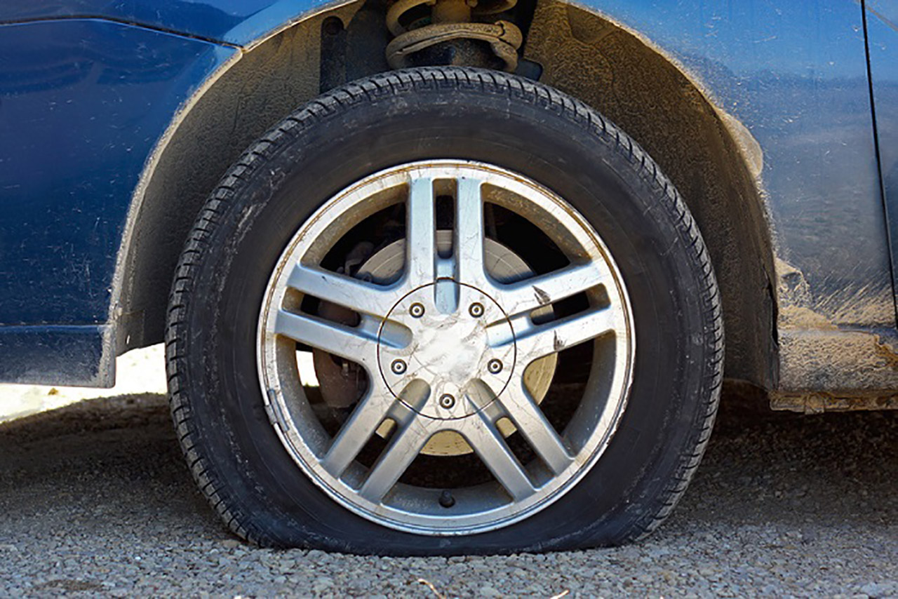 How to change a flat tire safely